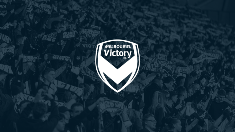 Melbourne Victory logo on a dark blue background.