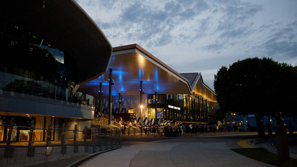 Image of Margaret Court Arena logo at night.