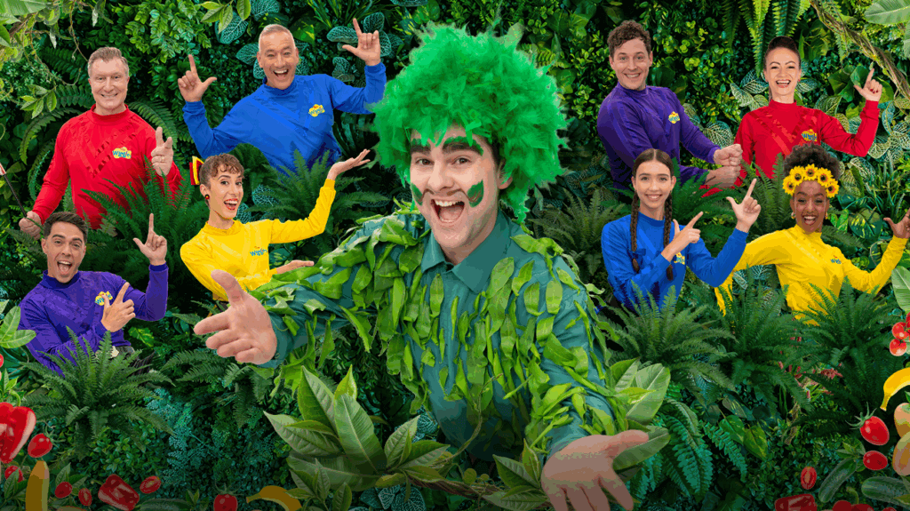 The Wiggles and the Tree of Wisdom, surrounded by colourful decorations.